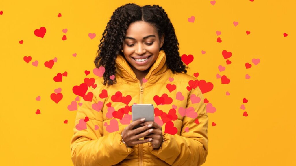 Happy woman sending love icons online